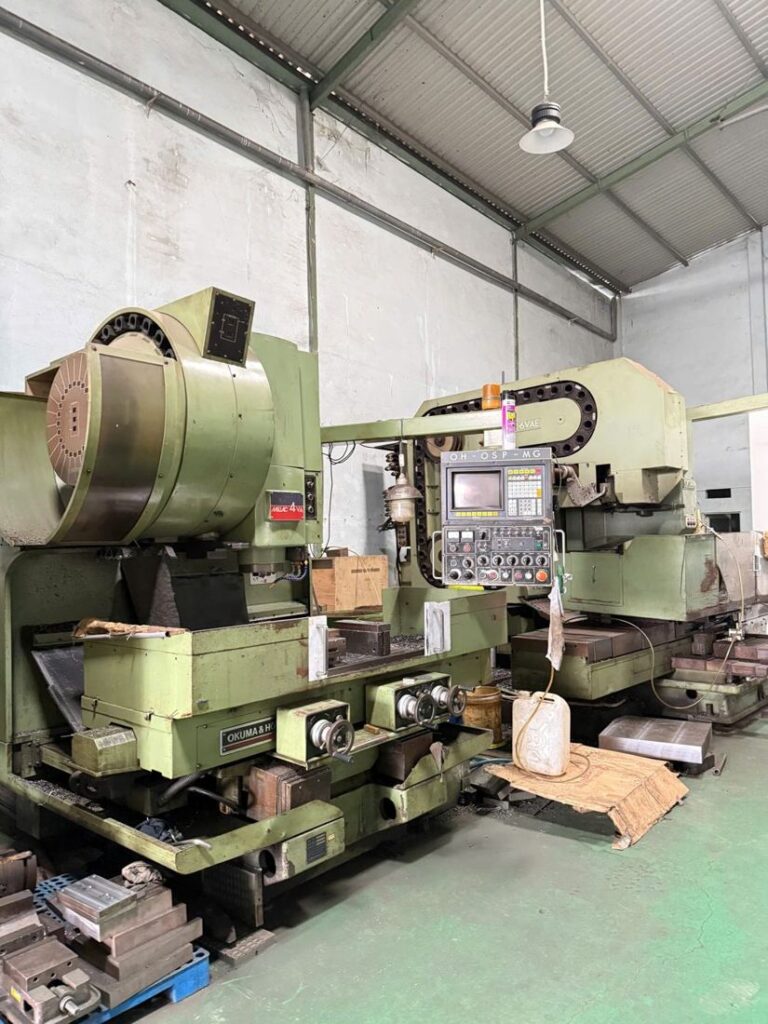 Máy phay CNC Okuma gia công khuôn huy chương